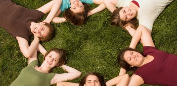Group of College Girls in a Circle